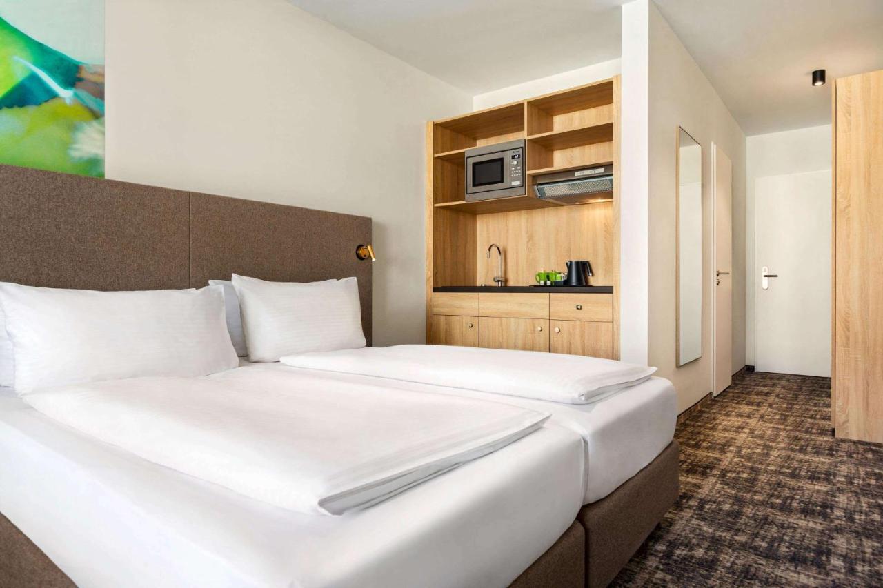 Hotel Wyndham Garden Munich Messe Esterno foto Room interior