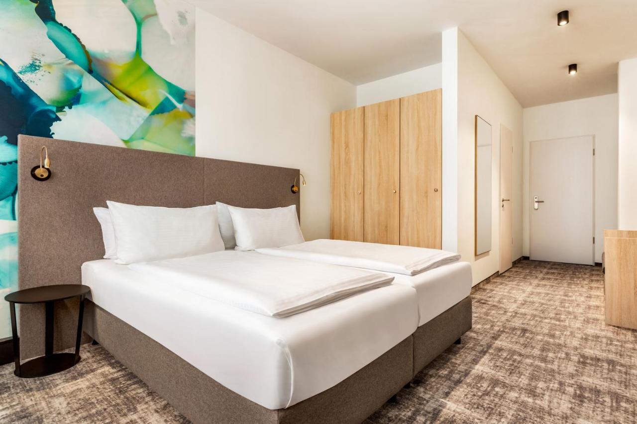 Hotel Wyndham Garden Munich Messe Esterno foto Room interior