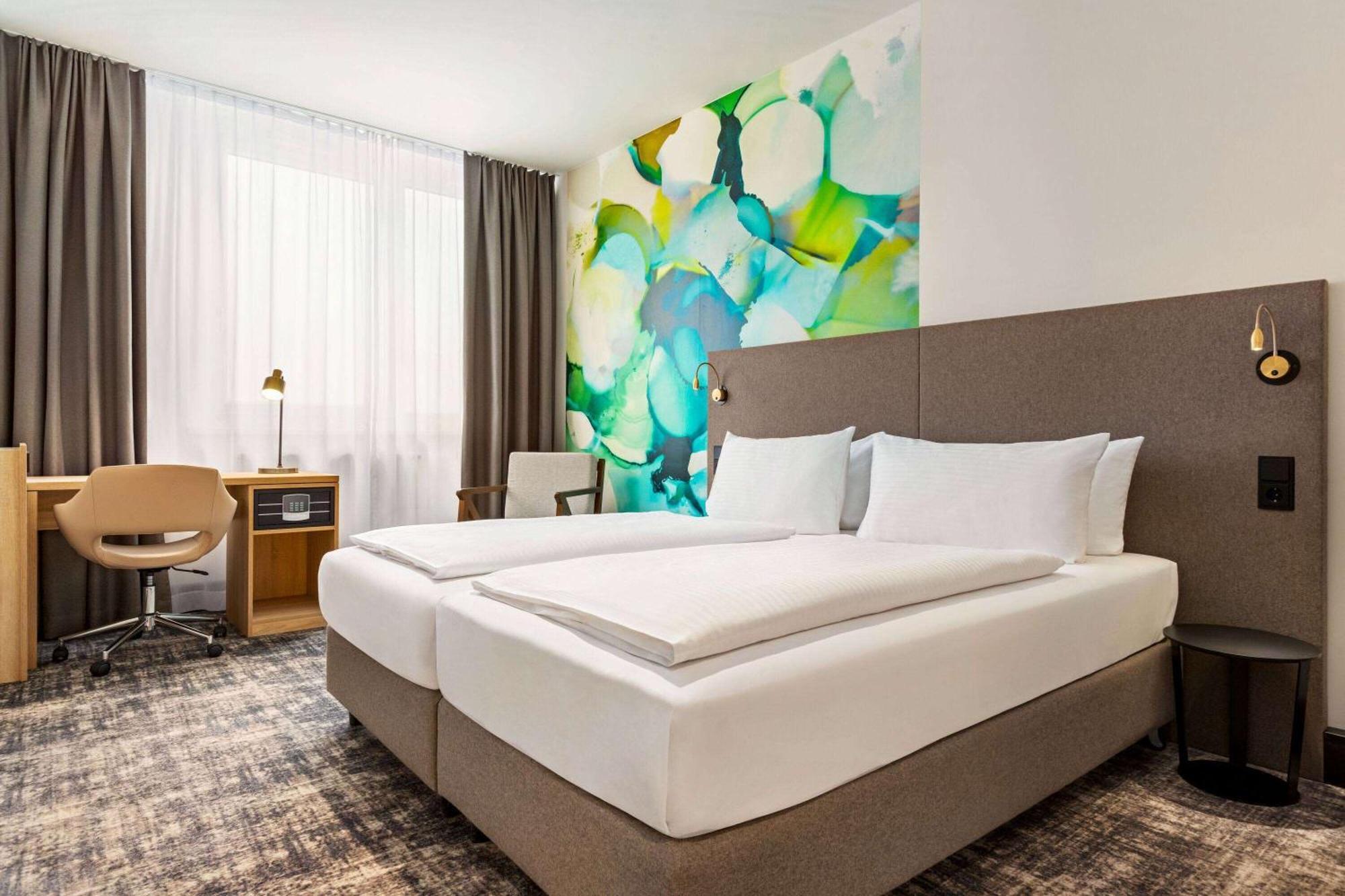 Hotel Wyndham Garden Munich Messe Esterno foto Room interior