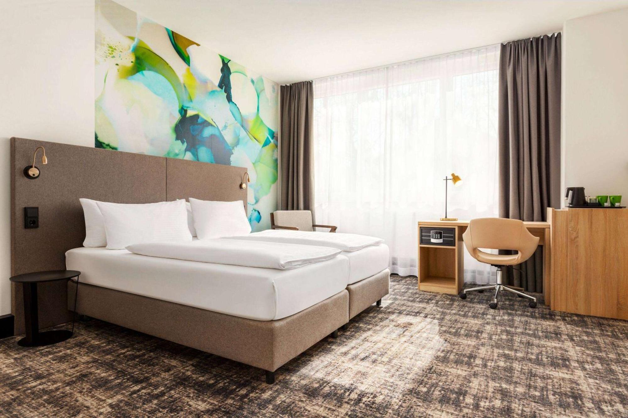 Hotel Wyndham Garden Munich Messe Esterno foto Room interior