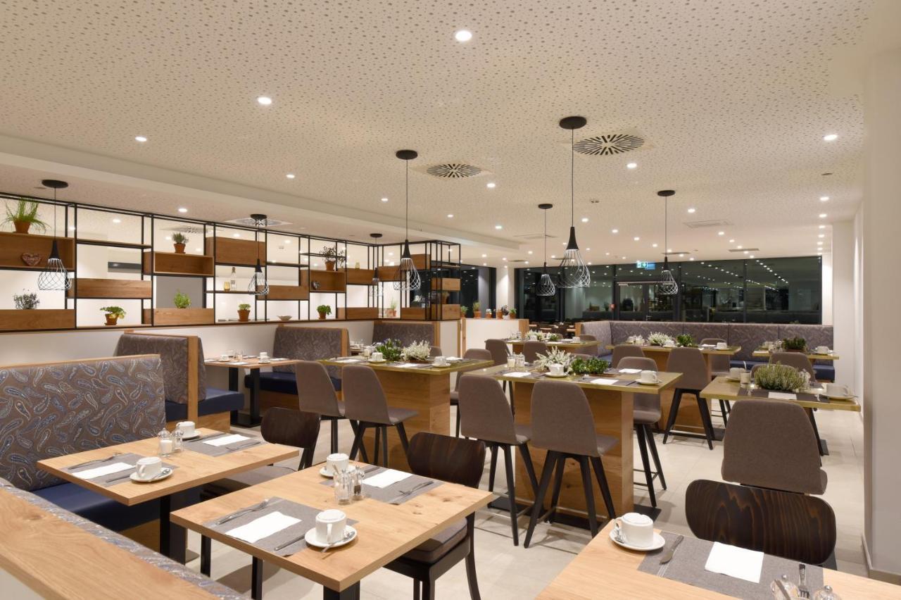 Hotel Wyndham Garden Munich Messe Esterno foto Restaurant