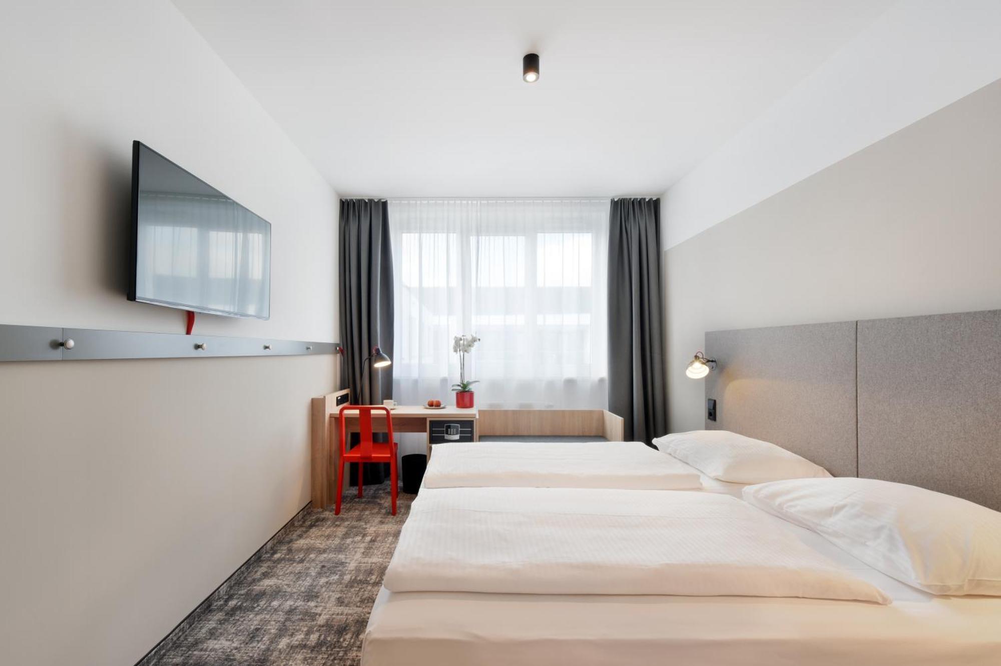 Hotel Wyndham Garden Munich Messe Esterno foto Room of the hotel